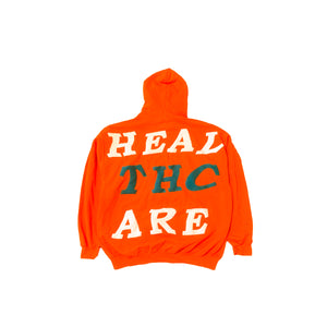 ORANGE SKUNK PULLOVER HOODIE